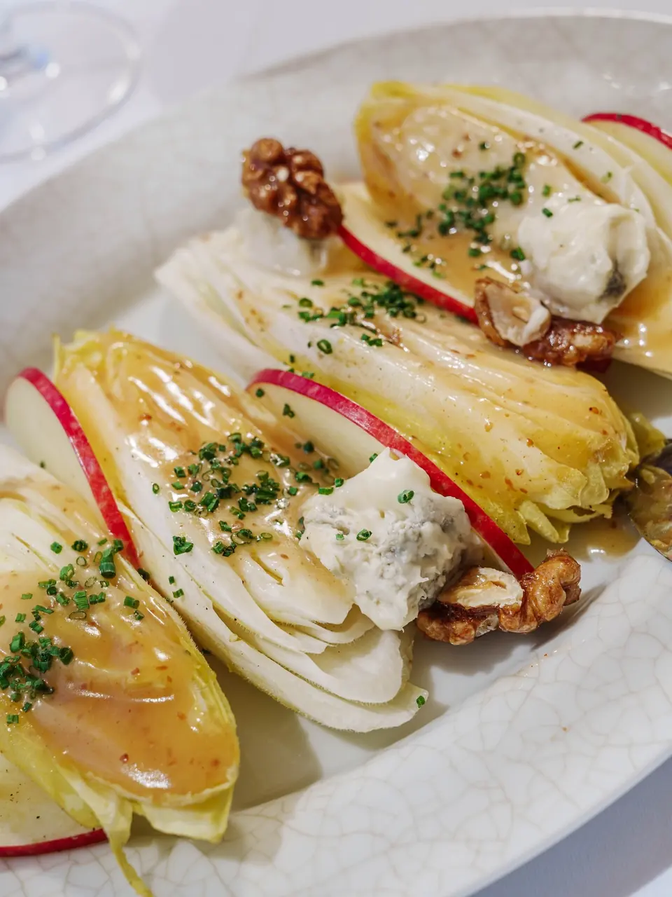 Endive salad with blue cheese, apple and caramelised walnuts